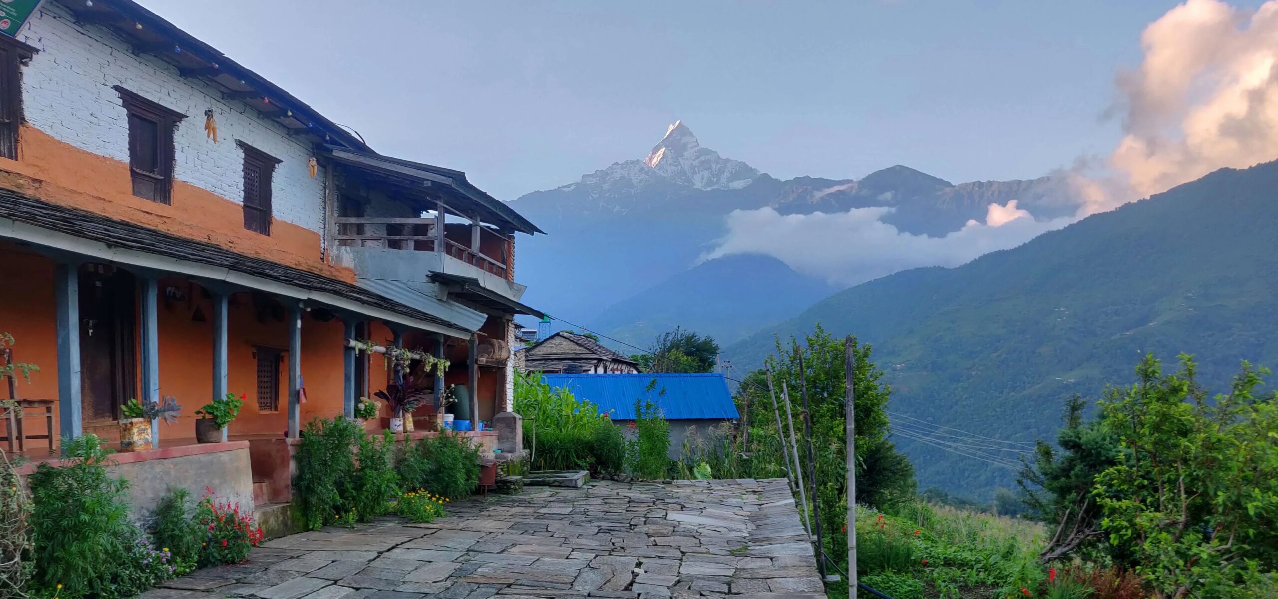 Traditional Gurung-style Lwang Homestay in Pokhara with scenic mountain views, terraced fields, and cultural hospitality experience.