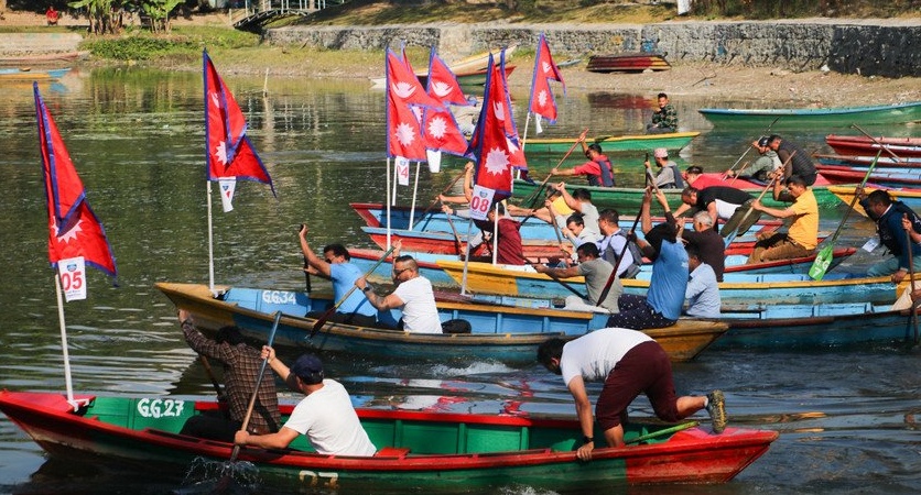 Participants on boat race. Three participants in on boat.